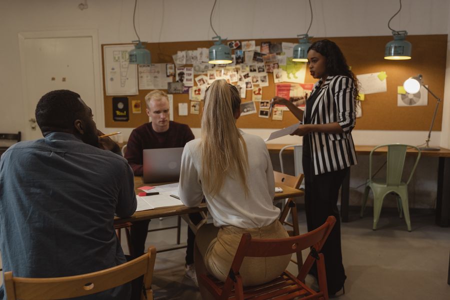 A manager leading a team meeting